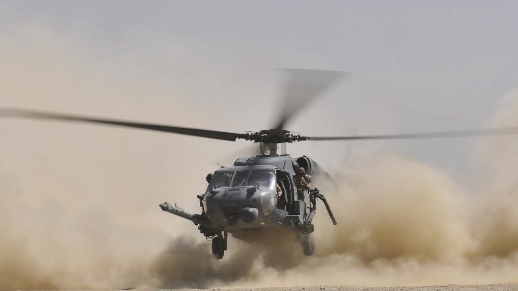 Grey helicopter on landing area
