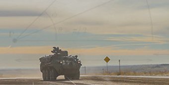 An armored vehicle uses a-pnt to navigate.