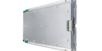 XCM3 electronic module with metal housings, connectors, and caution labels displayed side by side against a white background.